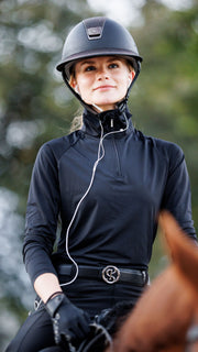 The GG 1/4 zip technical riding shirt with built in earbud pockets and cord keepers