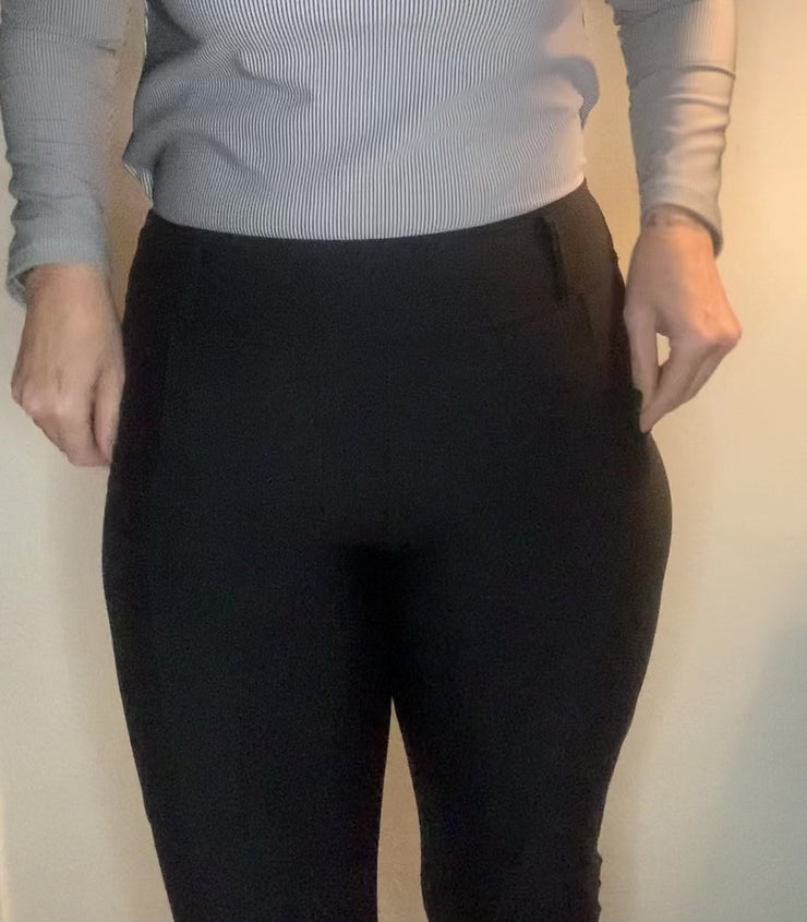Model showing a real life fit check of the Off Course breeches in size Medium in black. 