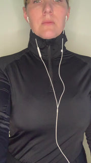 The GG 1/4 zip technical riding shirt with built in earbud pockets and cord keepers